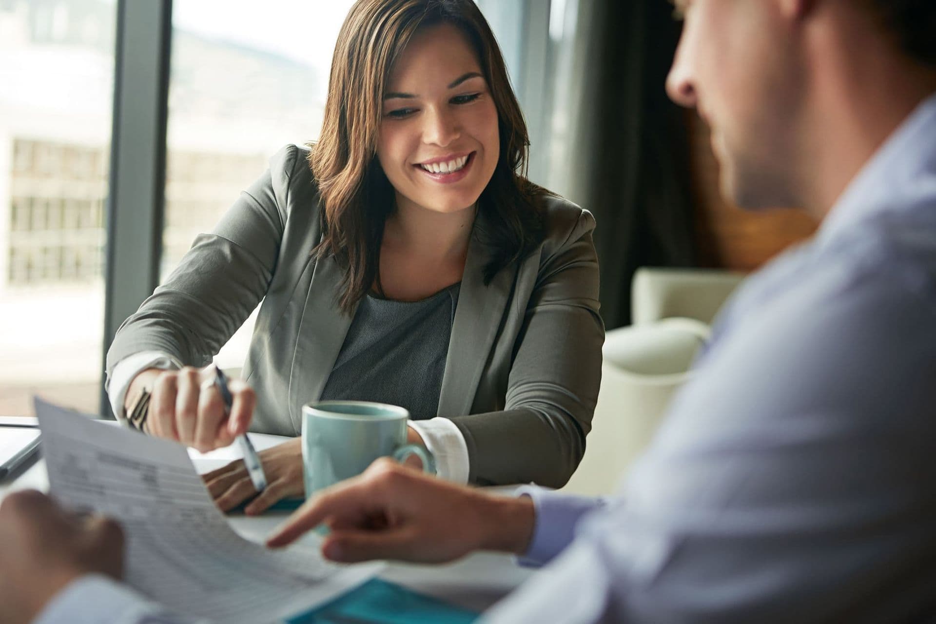 Smiling woman in a business meeting